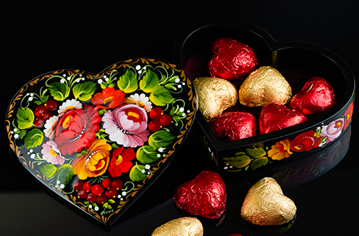Lacquered Heart-shaped Box on a black surface