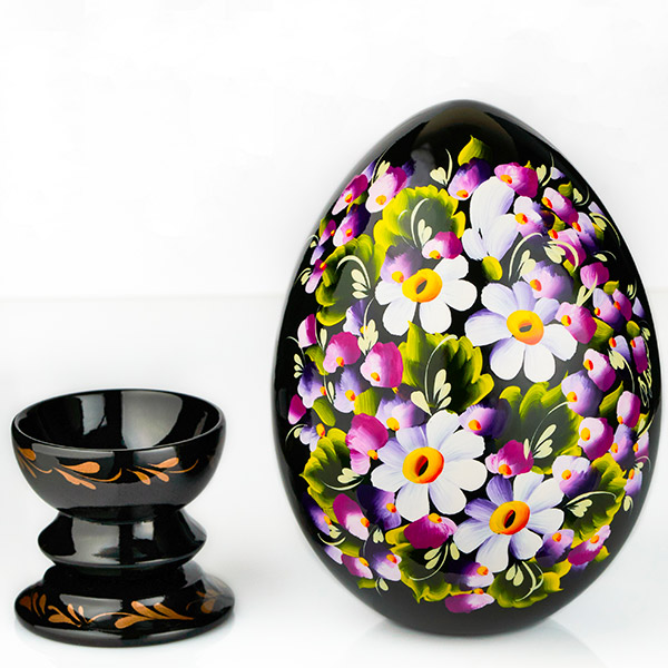 Hand painted wooden egg with a separated holder